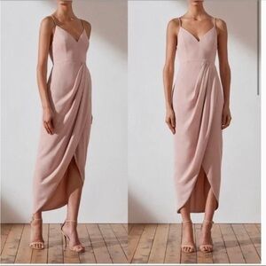 clemence high neck midi dress cream Be the best dressed Discover our Clemence High Neck Midi Dress in Cream featuring a gathered yoke waist and pleat detailing. Tap the link in bio to shop #ShonaJoy